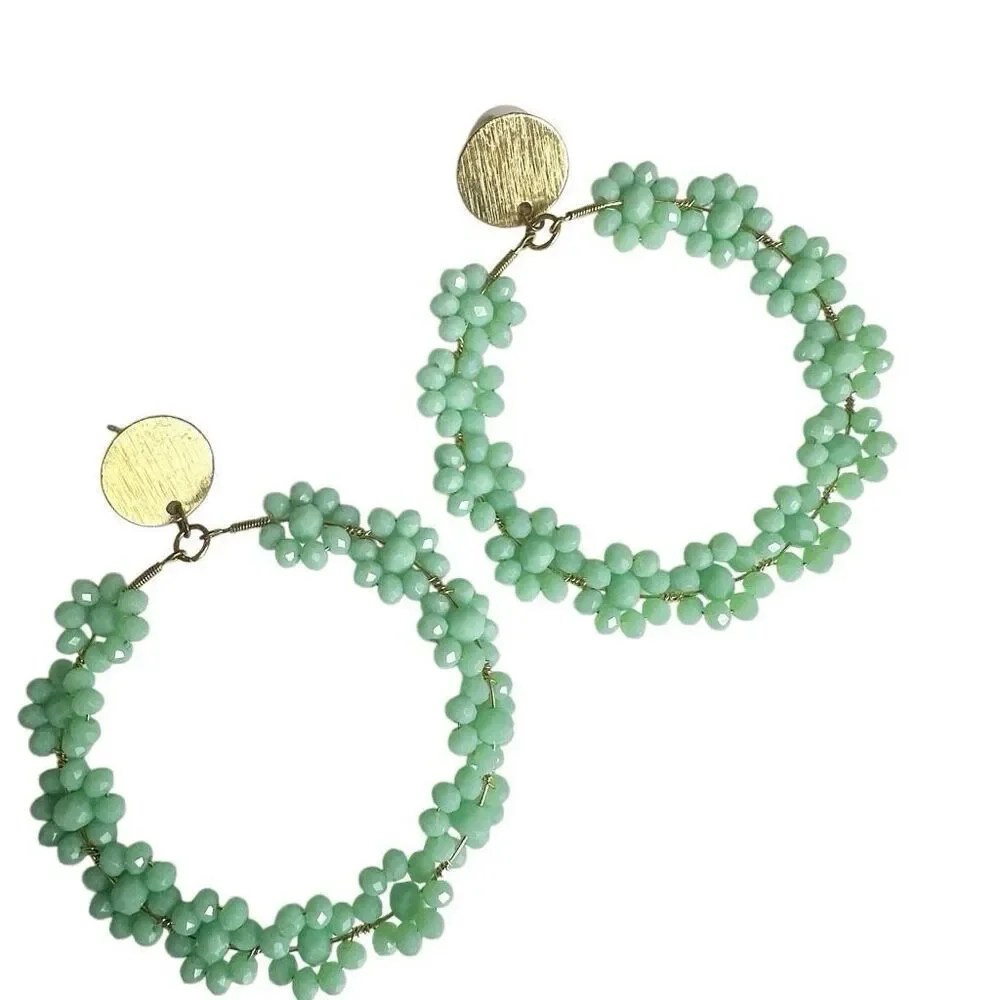 Large green floral circle statement earrings